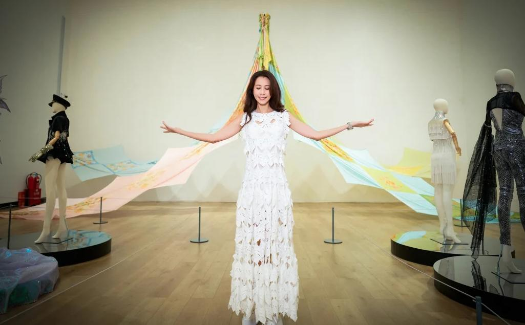 Karen Mok in the white woven look at a public appearance